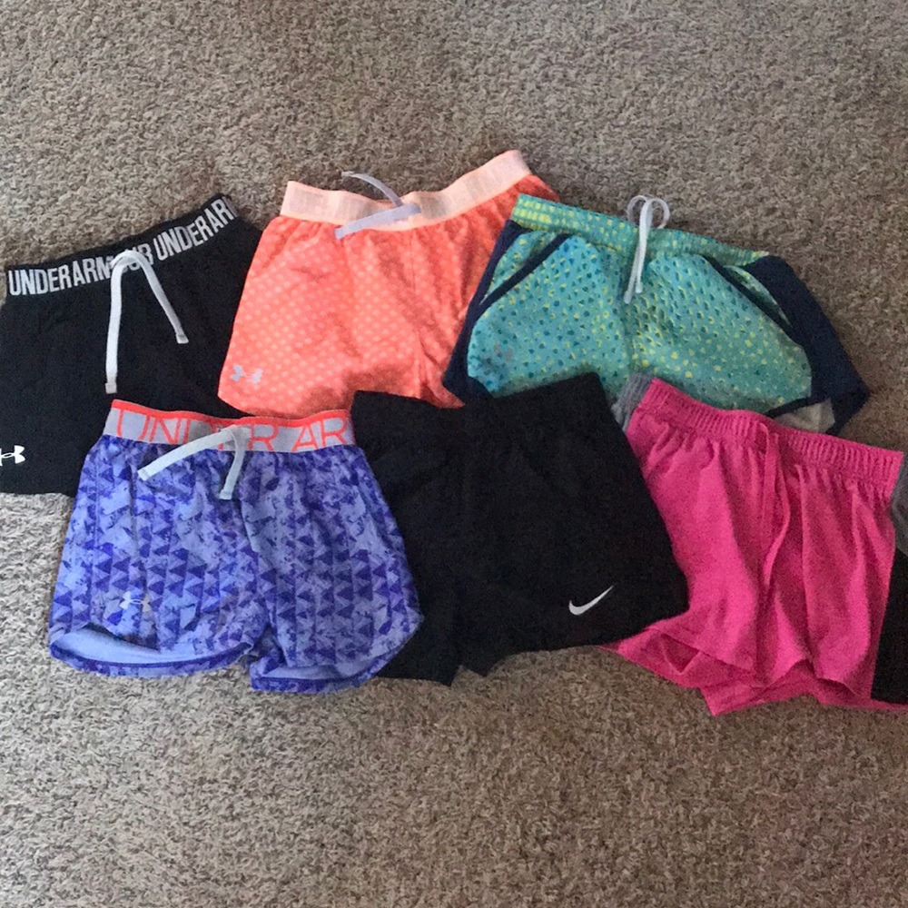 girls medium underarmour and nike shorts